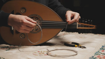 How to change oud instrument strings ?